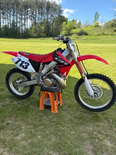 2004 Honda CR250R Two stroke. Second owner, I know the original owner, ownership in hand. This CR ha...