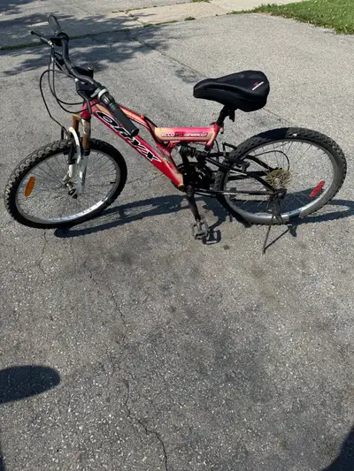 $40 for 24” red bicycle, got brand new grips and seat, only left side paddle is not straight Left si...