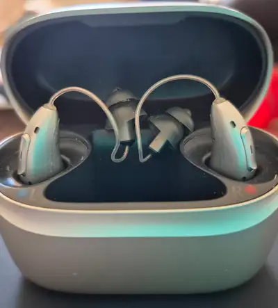 Selling phonak hearing aids, used for about 6 month's. Comes with charging case cleaning accessories...