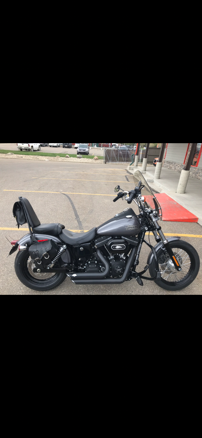 2014 Street Bob 103, upgraded bars, grips, has the sportier moustache bar instead of the big engine...