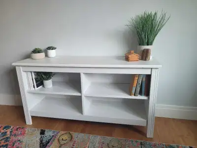 IKEA bookcase/shelf unit. 2.5 years old. Has a water stain on the top that we cover with decor. Dime...