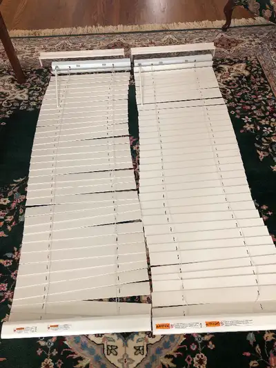 2 blinds perfect for French or patio doors. Each 20” wide and 64” long. 2” Faux wood slats in off wh...