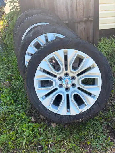 set of 4 Toyo mud/ snow studdable tires and rims off a 2020 GMC 1500 Sierra Denali. Rims Powder coat...