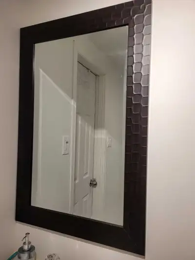 Mirror for any room or bathroom vanity 24 inches wide x36 inches high Perfect condition no scratches...