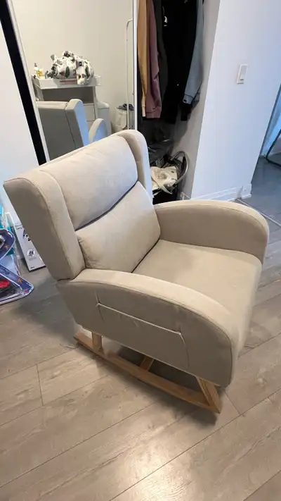 Comfy light grey nursery rocking chair, View more