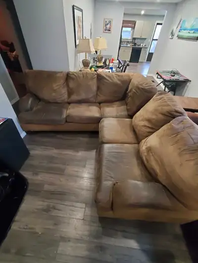 Well-used couch. Few rips and stains. Free for anybody to pickup. Can help load if needed.