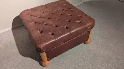 Leather ottoman with lots of storage space, View more