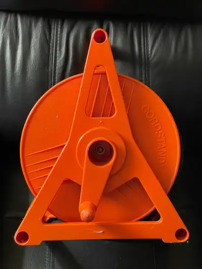 Keep your extension cords tangle-free with this orange Cord Stand cord storage reel. This previously...