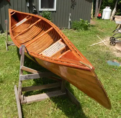 For sale 15 foot Chestnut canoe, late 1950's or early 1960's, refurbished inside and out, all the wo...