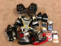 Variety of kids hockey equipment and accessories