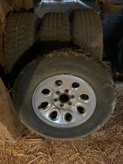 Set of Chevy rims complete with centre caps 265/70/17 snow tires are mounted on them. Asking $ 350 o...