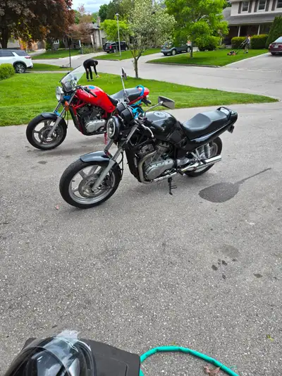 2 Suzuki VX800 motorcycles, both running, many spare parts. Package deal. Sold as is, but everything...