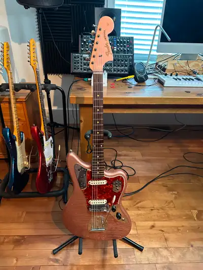 Genuine Pre CBS 1963 Fender Jaguar refin. All orignal hardware and electronics. Aged nitro Burgundy...