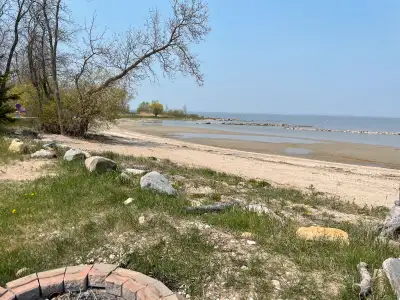 30 foot camper trailer available for rent 3 day minimum directly on the water. Private beach front w...