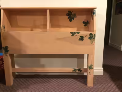 Hand painted wood headboard with built in bookshelf. Great for books, stuffed animals, etc