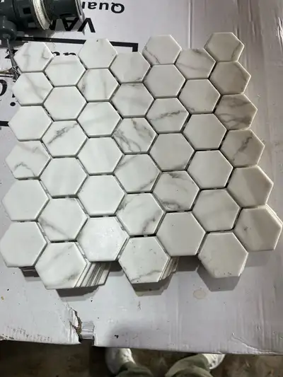 10 Porcelain tiles. 1 square foot per tile. Sold together. OBO