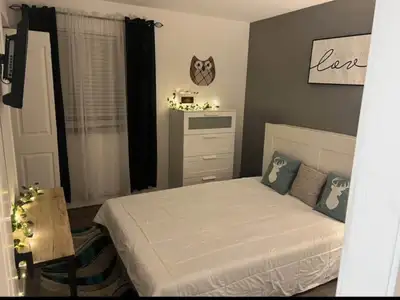 Furnished room with Queen bed for rent in Luxstone Airdrie, utilites included. Shared washroom and k...