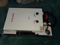 Gasland Portable gas water heater 1.58GPM *as is* for parts