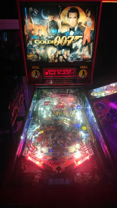 Sega Goldeneye Pinball Playfield with clear coat Rails and legs powder-coated All the decals are new...