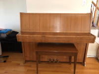 Petrof piano with bench