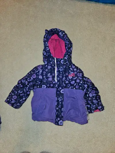 Purple and pink snow suit for girls 3T. Storm flap and cuffs at wrists and ankles. Hood cannot be de...