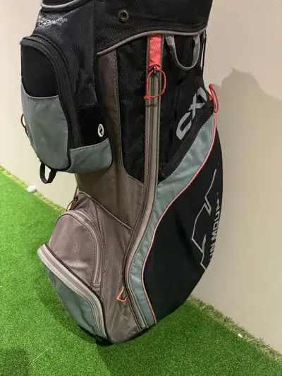Great cart bag with 15 individual full-length dividers. Also features 8 pockets including a cooler p...