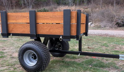 New Yard Trailer 4x3 box with tilt and removable side rails. Heavy duty, can handle 760lbs. Has tie...