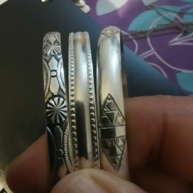 three beautiful silver bracelets62864360843523121