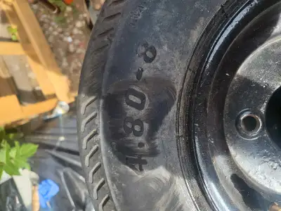 2 4on4 rims and tires great shape 50$ firm text 2897880332 I will not respond on here.