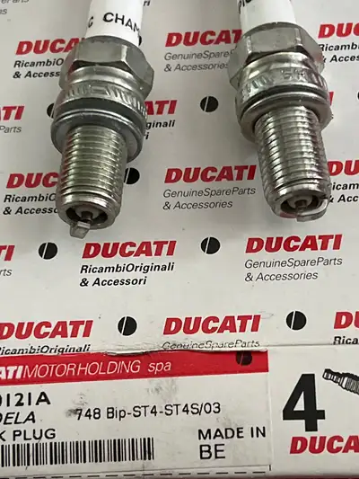 New Ducati Factory Original parts spark plugs fits 748/916/996, Monster S4/S4R, ST, SS $30. each New...