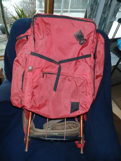 Full sized backpack. Bag measures 55cmx35cmx20cm (2350 cu.in.). Frame is 35x85cm. Three zippered pou...