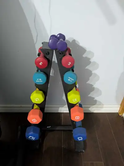 A set of colourful weights dumbells ranging from 1 lb to 10 lbs. In good condition. Comes with the r...