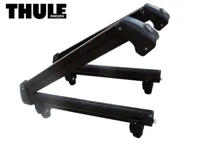 Thule old school Ski & Snowboard Racks for Sale. Each rack measures 22” long. The soft rubber sandwi...