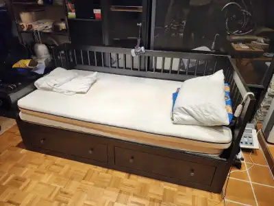 Ikea extendable bed with mattresses. , View more