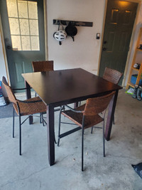 Tall wood table a 4 chairs