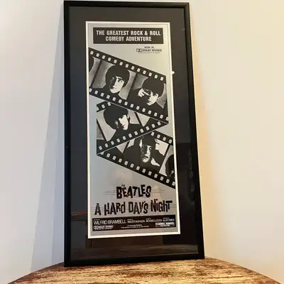 Offered for sale is a professionally framed A Hard Day's Night movie poster. This one-sheet poster i...