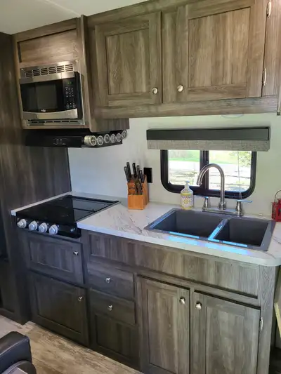 2020 Highland Ridge Open Range 182RB it is a lightweight 18-foot (approx. 22-23' total length) singl...