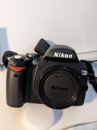 Nikon D60 digital SLR, Nikkor AF-S 18-55 mm Lens, & a tripod