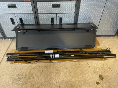 Toyota brand tonneau cover try fold hard top. Fits 2024 to 2026 Tacoma with 6’ box. Used for one mon...