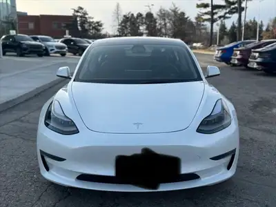 I'm selling my sleek, white 2022 Tesla Model 3 AWD Long Range, perfect for zipping around town or em...