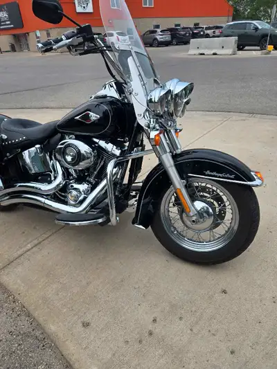Selling my 2012 Harley Davidson 103 twin cam Heritage classic softail with 54,054 km. Comes with sta...