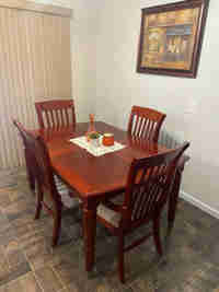 Cherry wood table and chairs with china cabinet 