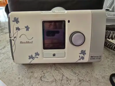 ResMed Air Sense 10 CPAP machine and accessories, plus convenient case with strap. In excellent cond...