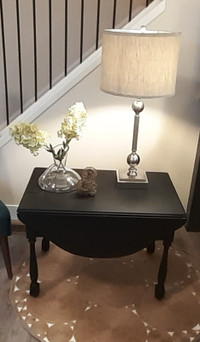 Sophisticated Matte Black Antique Dropleaf Table with Drawers