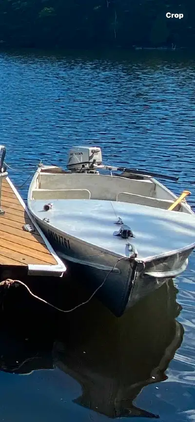 15hp Honda 4-Stroke engine, well maintained. Has electric start and moves pretty quick on this boat....
