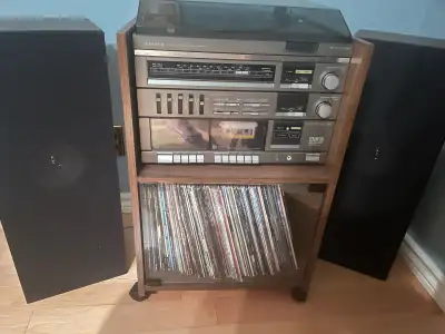 Older turntable/radio/cassette tape music system, View more