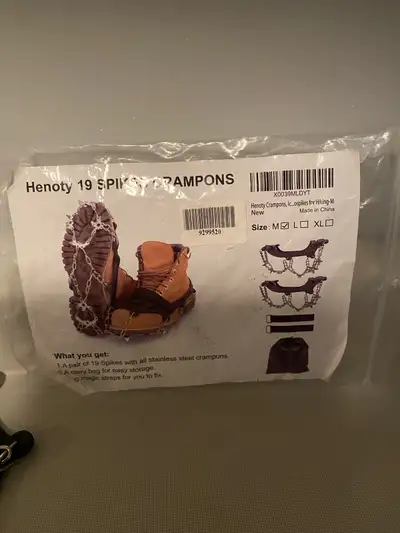 New 19 spikes cleats size medium comes with two adjustable straps and carrying case pick up Elmwood...