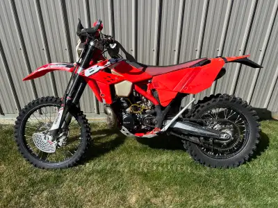 Bike has a lot of aftermarket protection products on it. Bark busters. Skit plate. Front and rear di...