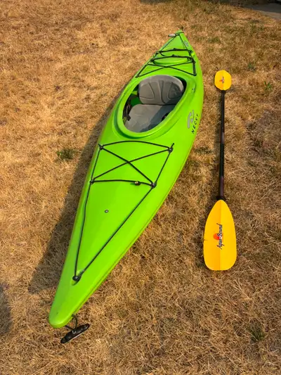 This is a great all around kayak and paddles beautifully! It is 10'11" and the upgraded Manitou Spor...