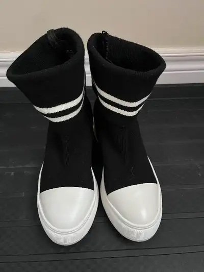 Like new condition girls boots, size 6, selling for $5. From pet free and smoke free family. Pick up...